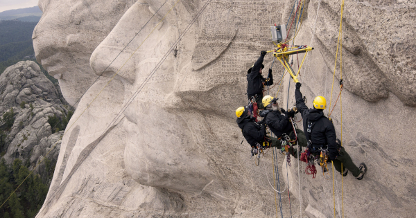 MOUNT RUSHMORE: GREENPEACE ACTIVIST RESCUED AFTER GETTING STUCK IN THEODORE ROOSEVELT’S NOSTRIL